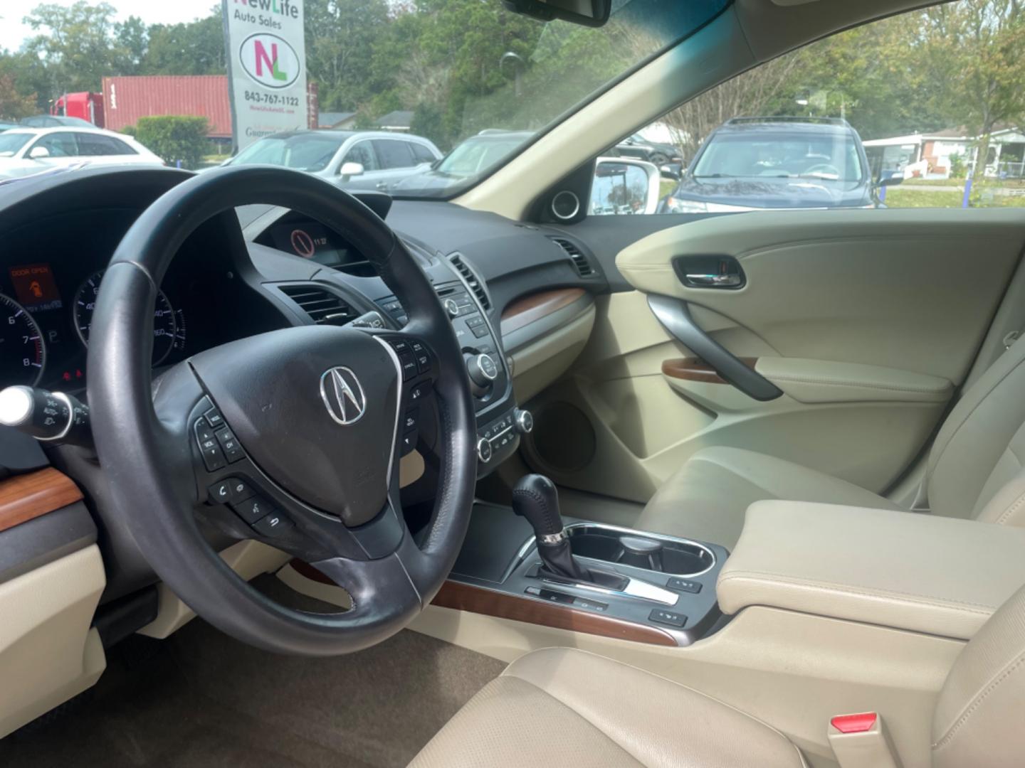 2013 WHITE ACURA RDX (5J8TB3H33DL) with an 3.5L engine, Automatic transmission, located at 5103 Dorchester Rd., Charleston, SC, 29418-5607, (843) 767-1122, 36.245171, -115.228050 - Certified One Owner Vehicle with Leather, Sunroof, CD/AUX/Sat, Hands-free Phone, Backup Camera, Dual Climate Control, Power Everything (windows, locks, seats, mirrors), Heated Seats, Push Button Start, Keyless Entry, Alloy Wheels. 146k miles Located at New Life Auto Sales! 2023 WINNER for Post & Co - Photo#22